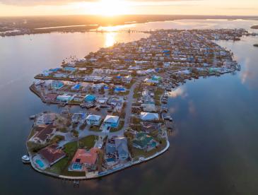Homes on an island community in Florida, viewed from overhead.