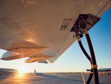 Refueling of an airplane before flight, shown close up.